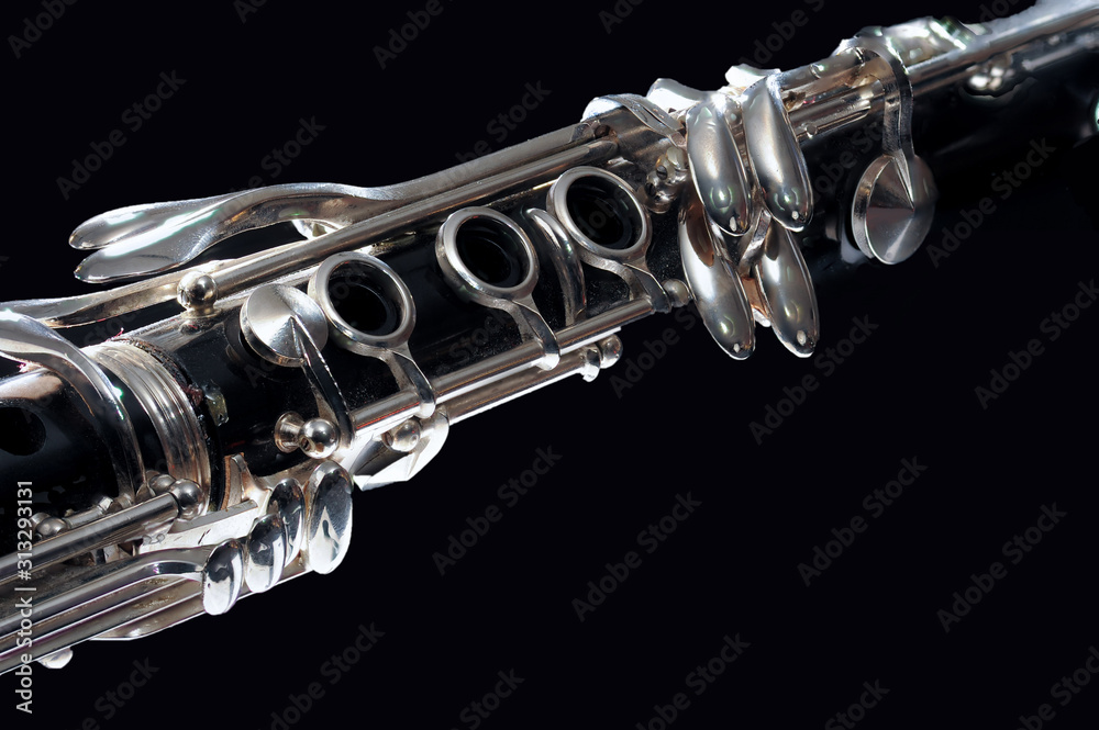 Obraz premium Black clarinet silver keys closeup studio