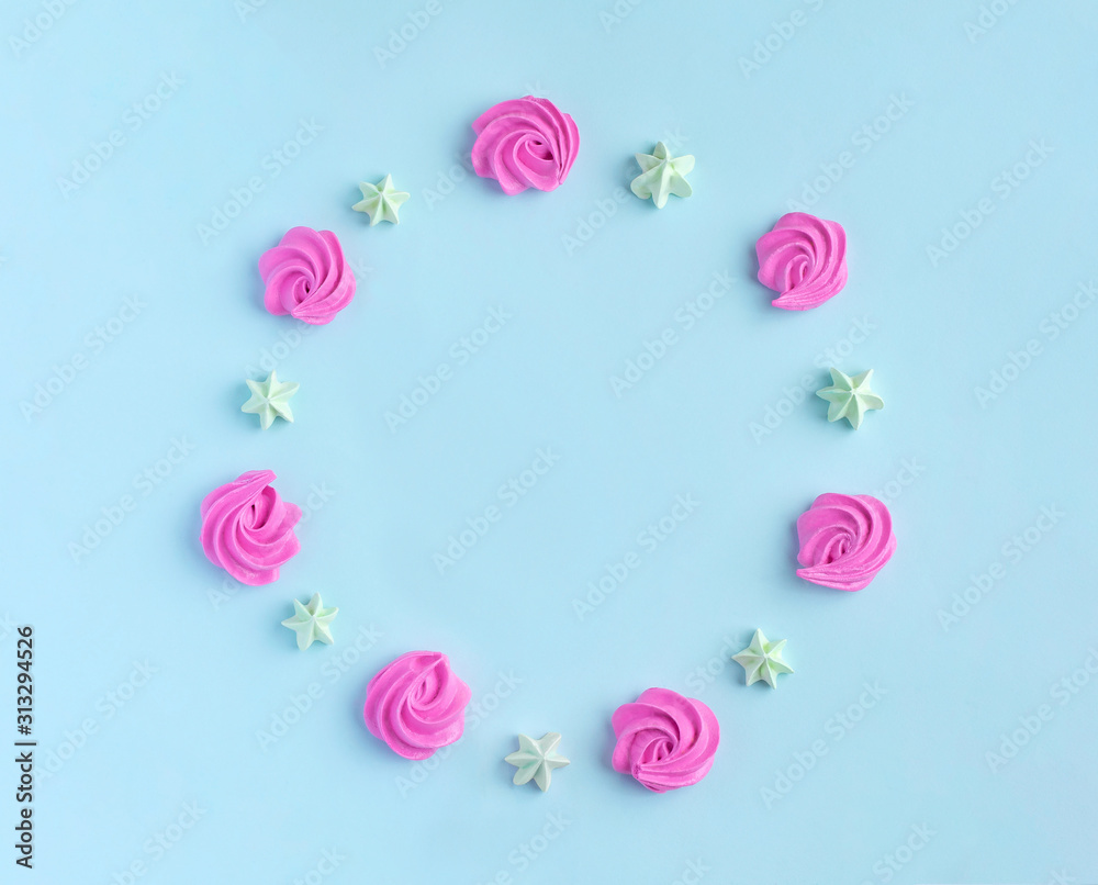 Circle of little meringues in pastel colors on a pink background. Valentine, Mom's Day, Circle of little meringues in pastel colors on a pink background. Valentine, Mom's Day,