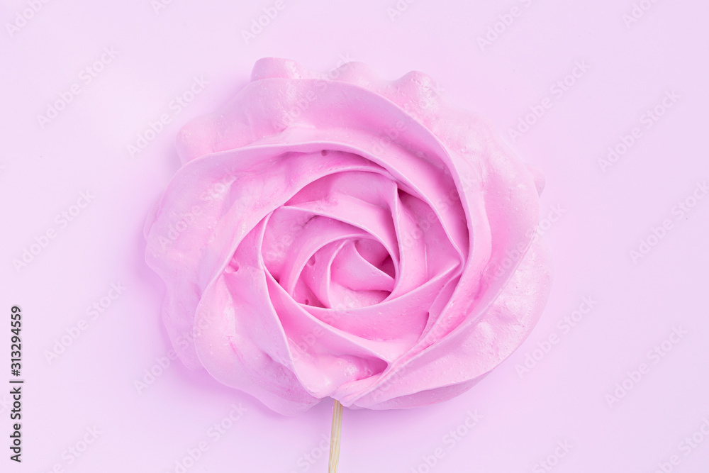Pink Rose meringues in pastel colors on a pink background. Valentine, Mom's Day.Medicine. Women Health Pink Rose meringues in pastel colors on a pink background. Valentine, Mom's Day.Medicine. Women Health