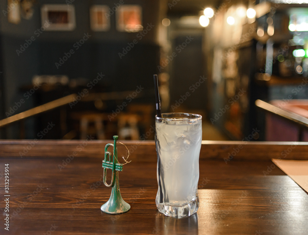 glass of beer on wooden table in a restaurant glass of beer on wooden table in a restaurant