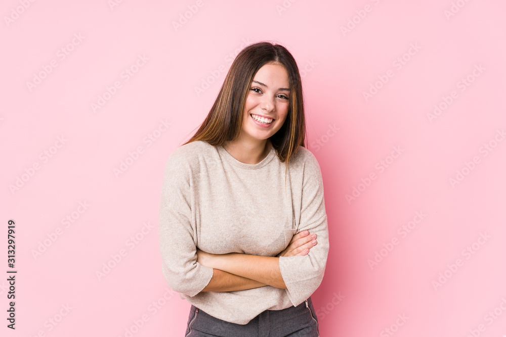 Young caucasian woman posing isolated laughing and having fun. Young caucasian woman posing isolated laughing and having fun.