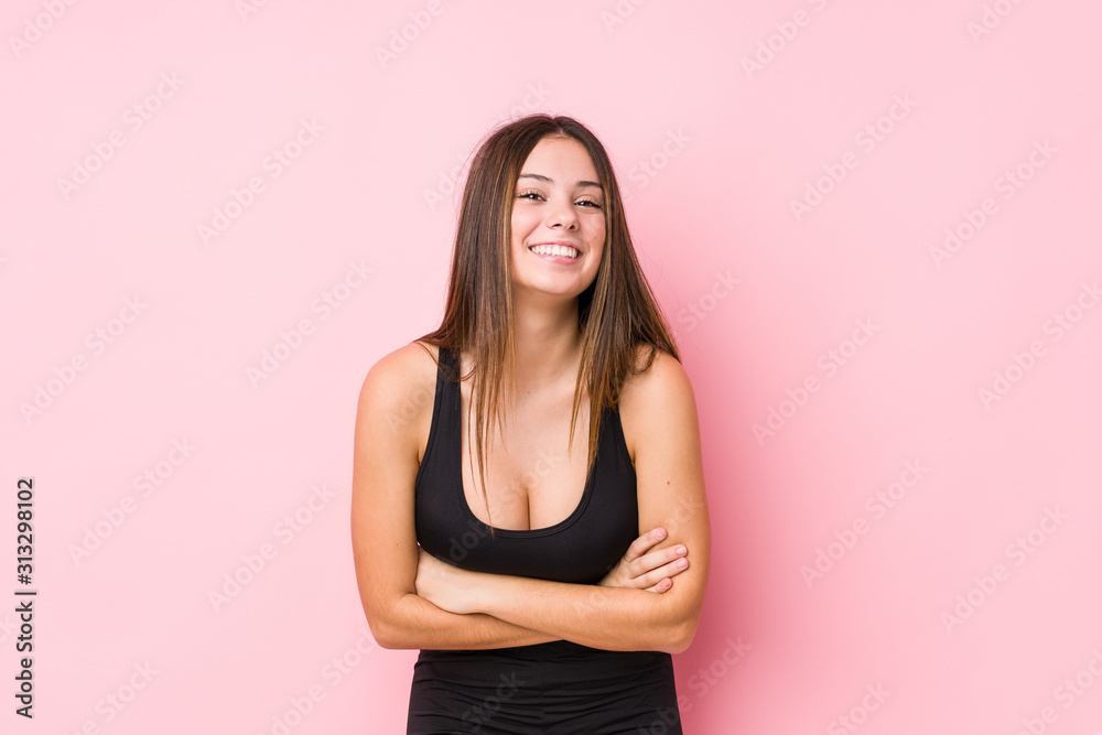 Young fitness caucasian woman isolated laughing and having fun. Young fitness caucasian woman isolated laughing and having fun.