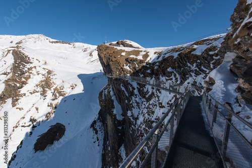 Grindelwald First switzerland cliff walk in winter time. photo