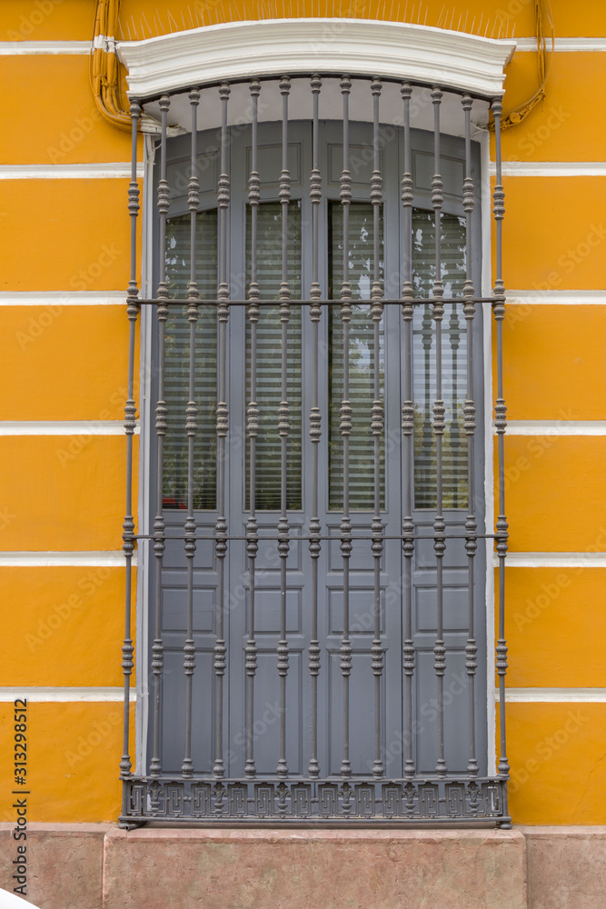 Window with iron fence