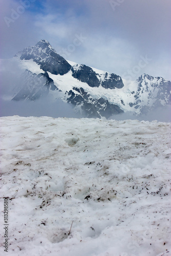 Mountain hidden through clouds