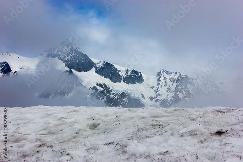 Mountain hidden through the clouds