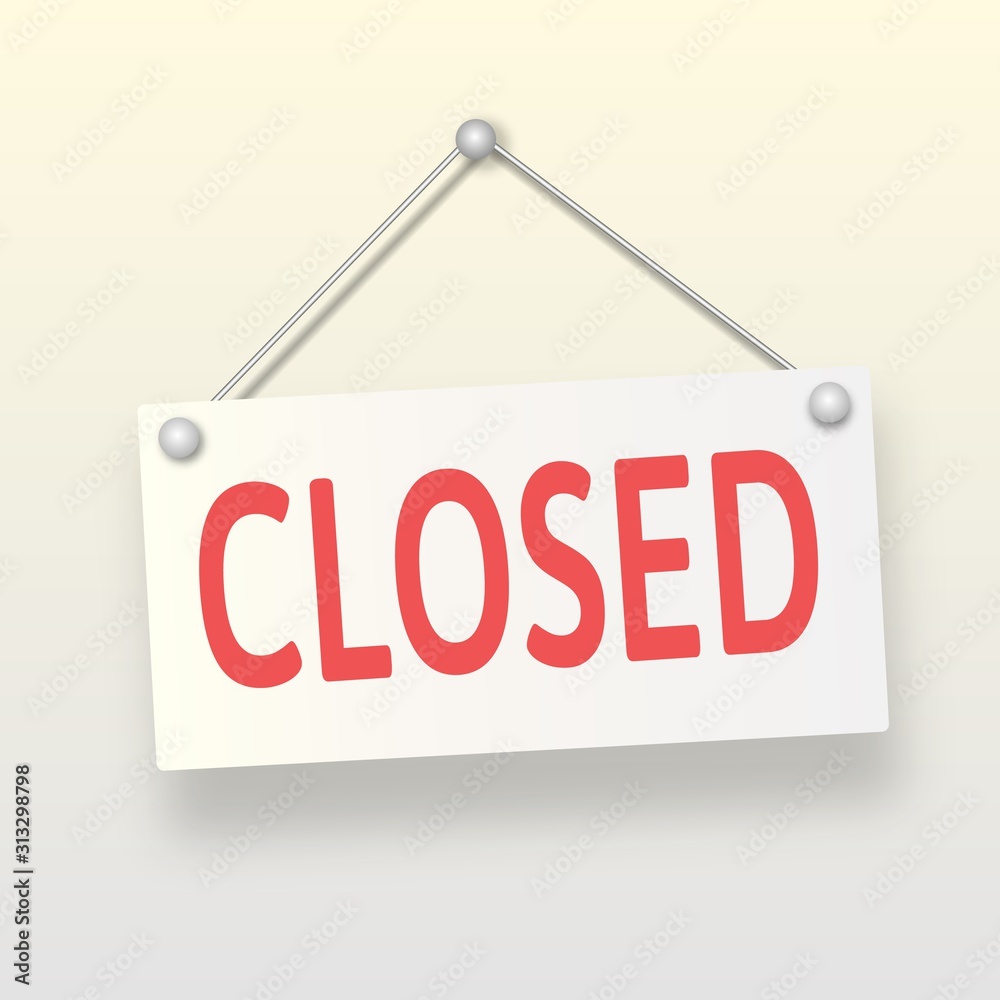 Closed sign board hanging on the white wall Closed sign board hanging on the white wall