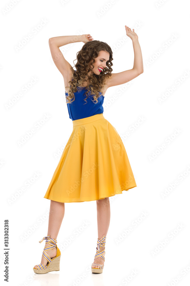 Carefree Woman Is Dancing In Platform Shoes And Vibrant Clothes Carefree Woman Is Dancing In Platform Shoes And Vibrant Clothes