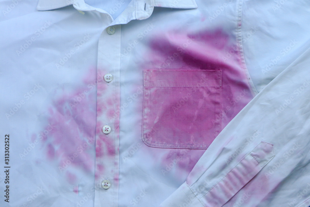Fototapeta premium Dirty shirt with wine spots, close up