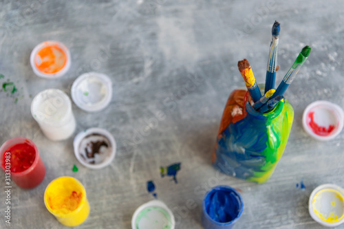 Wallpaper Mural Paint brushes on grey background, artistic craft concept, space for text Torontodigital.ca