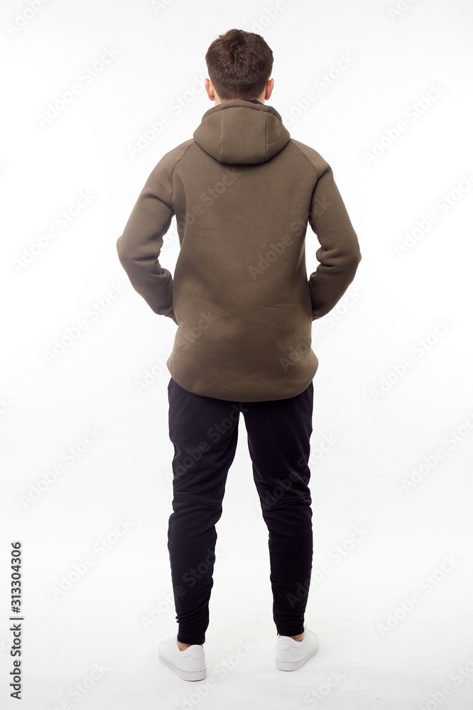 Fototapeta premium Man wearing in khaki hoodie isolated on white background. Back view.