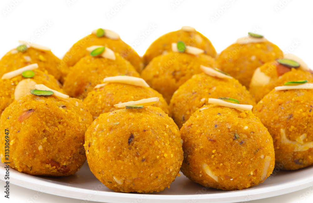Indian Traditional Winter Sweet Food Methi Laddu Also Know as Methi Ke Laddu or Fenugreek Laddu Made From Fenugreek Seeds, Ginger, Saunf And Jaggery Indian Traditional Winter Sweet Food Methi Laddu Also Know as Methi Ke Laddu or Fenugreek Laddu Made From Fenugreek Seeds, Ginger, Saunf And Jaggery