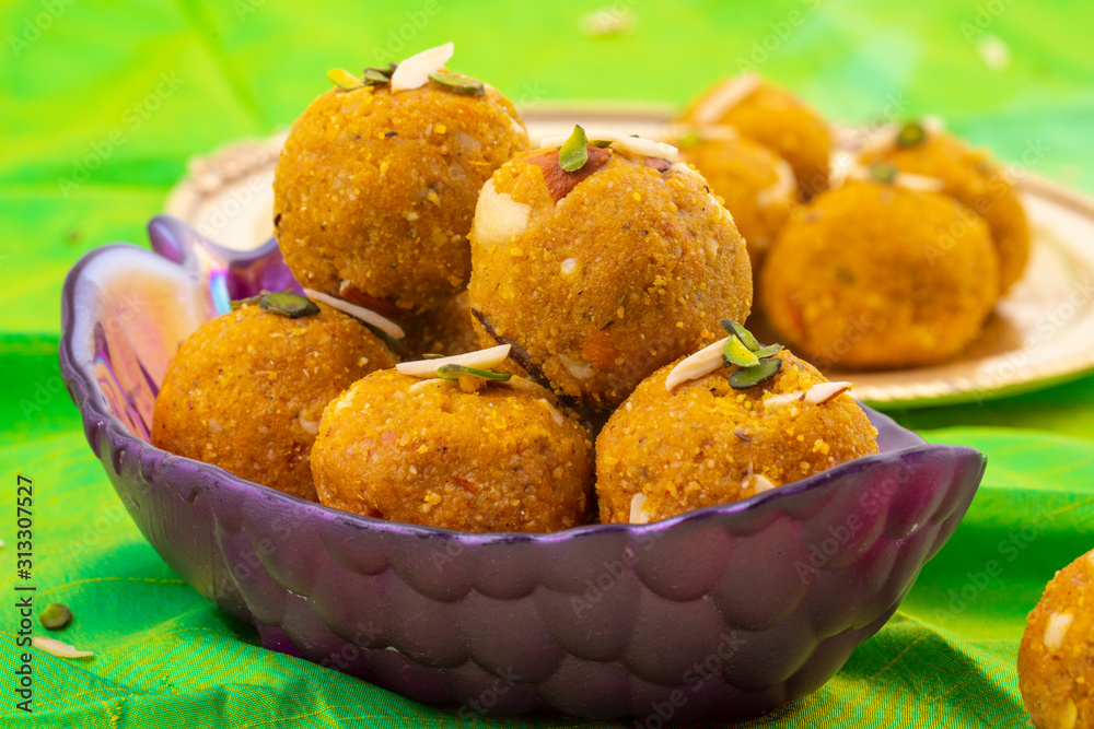 Indian Traditional Winter Sweet Food Methi Laddu Also Know as Methi Ke Laddu or Fenugreek Laddu Made From Fenugreek Seeds, Ginger, Saunf And Jaggery Indian Traditional Winter Sweet Food Methi Laddu Also Know as Methi Ke Laddu or Fenugreek Laddu Made From Fenugreek Seeds, Ginger, Saunf And Jaggery