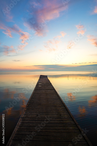Fototapeta Naklejka Na Ścianę i Meble -  wooden pier in the sunset
