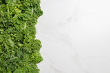 Free space with kale on white background
