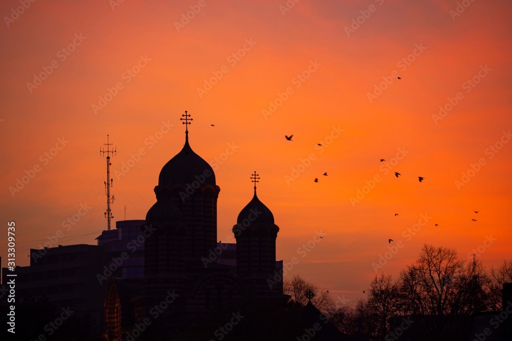 Silhouette of the Church with domes in the early morning