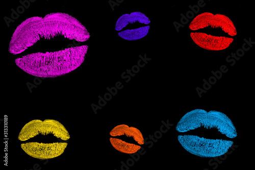 Lips and kiss. Print of multi-colored lipstick. Traces of lipstick and kisses, copy space.