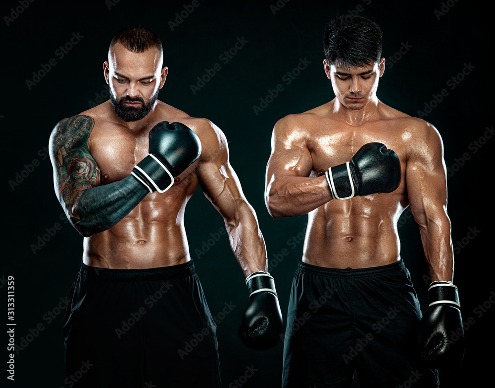 Boxing concept. Sport and fitness motivation. Individual sports recreation. Group of boxers in gloves isolated on black background.