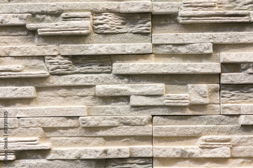 Beige decorative stone for decoration. Beige Stone Background Beige decorative stone for decoration. Beige Stone Background