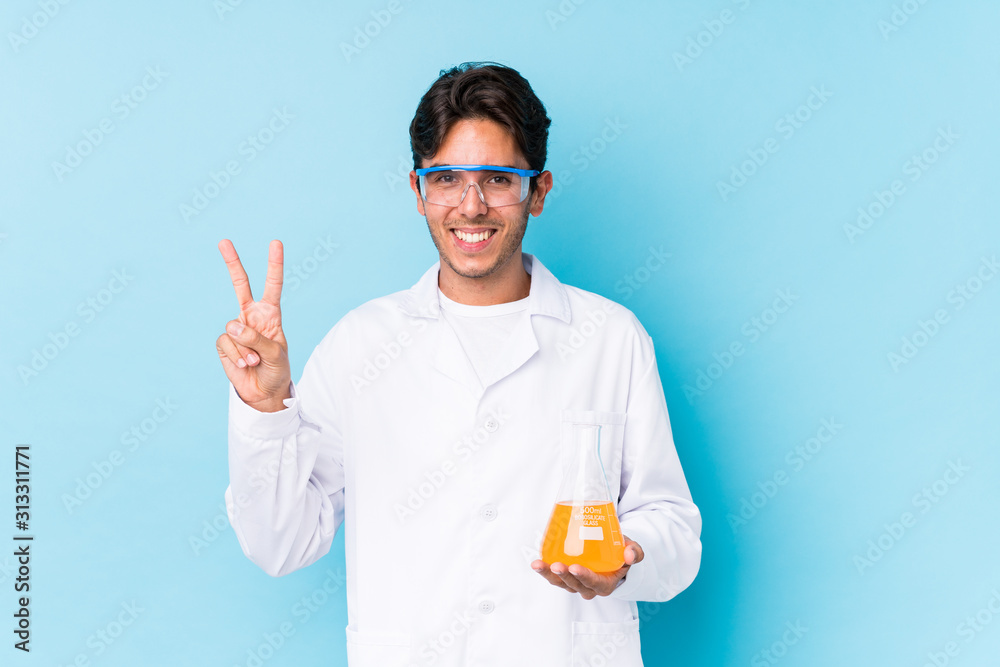 Young cientific caucasian man isolated showing number two with fingers. Young cientific caucasian man isolated showing number two with fingers.