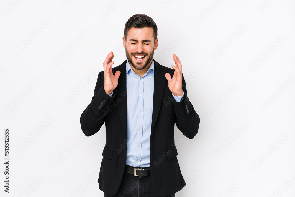 Young caucasian business man against a white background isolated joyful laughing a lot. Happiness concept. Young caucasian business man against a white background isolated joyful laughing a lot. Happiness concept.