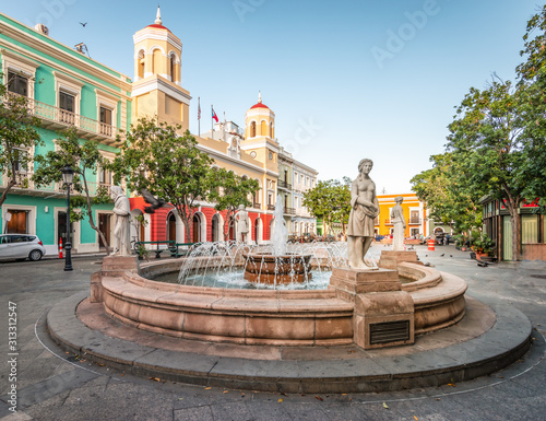 Plaza de Armas, town square with fountain in the city centre of Old San Juan, Puerto Rico. photo