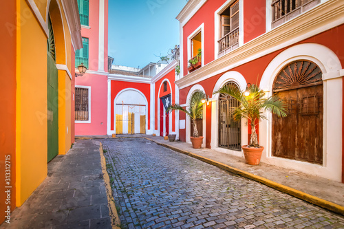 Cobblestone street in Old San Juan, Puerto Rico. Evening view. photo