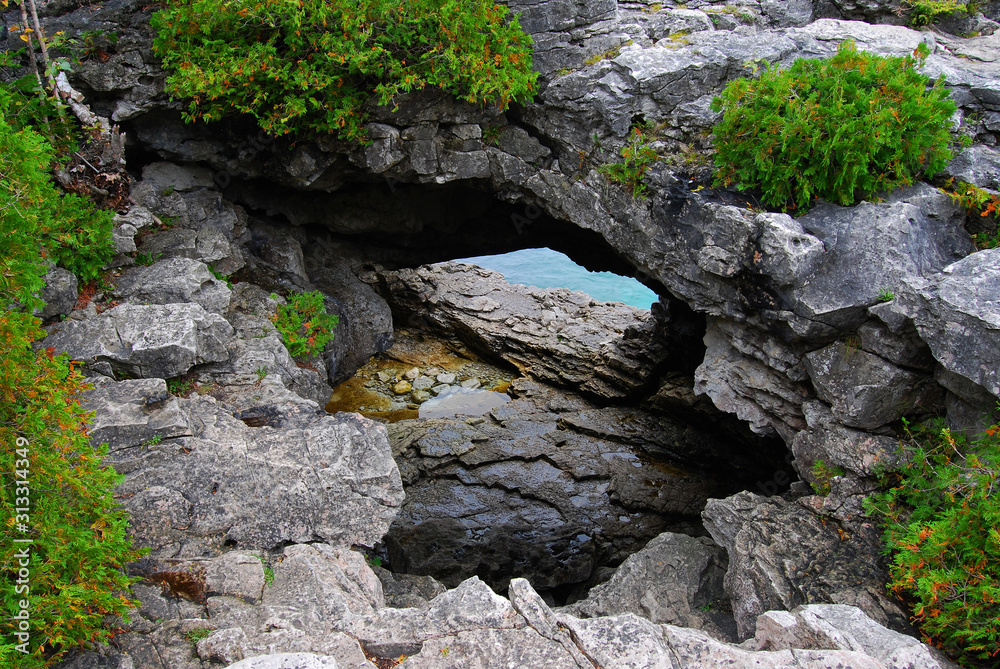 Small Cave with Water View in Tobermory Georgian Bay Area Ontario Small Cave with Water View in Tobermory Georgian Bay Area Ontario