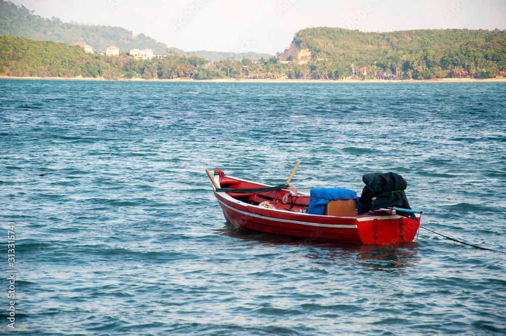 Floating boat in the sea