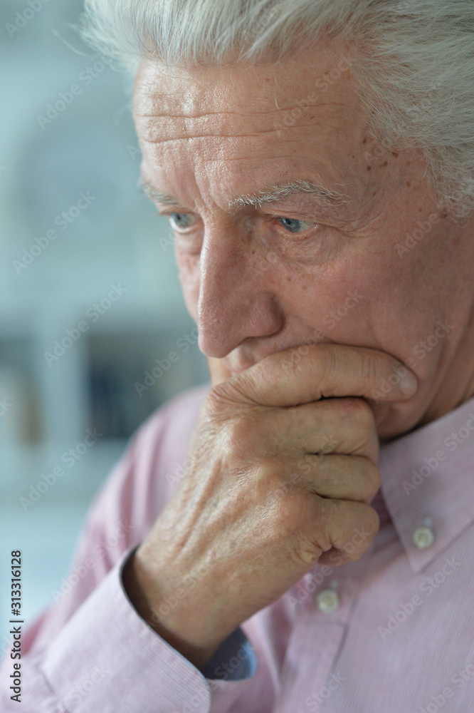 Close up portrait of thoughtful senior man Close up portrait of thoughtful senior man