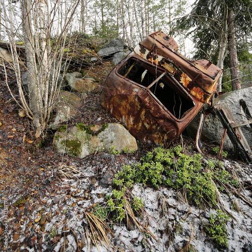 Old truck’s cabin forgotten into forest in Southern Finland. 