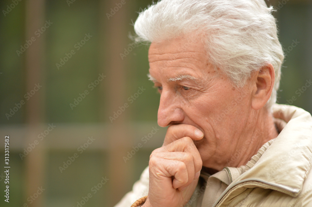 Close up portrait of serious senior man thinking Close up portrait of serious senior man thinking