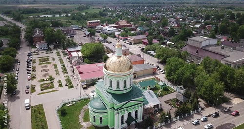 Aerial panoramic view of modern cityscape of Ozyory overlooking Orthodox Holy Trinity Church, Russia photo