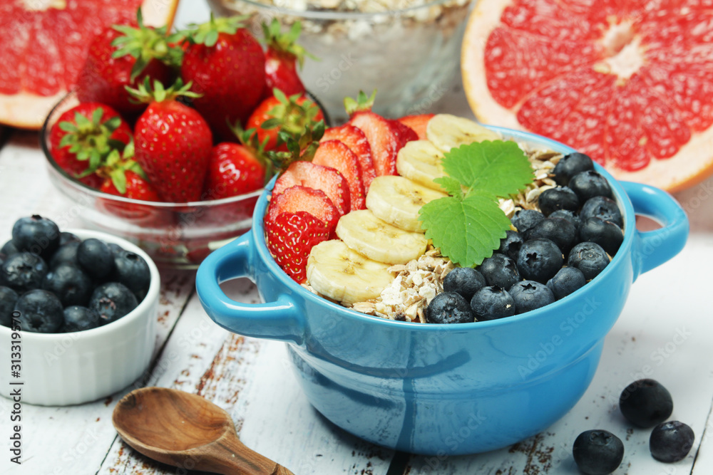 Healthy diet breakfast including cereal with berry and fruits Healthy diet breakfast including cereal with berry and fruits