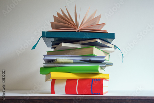 Stack of different books   free space for text
