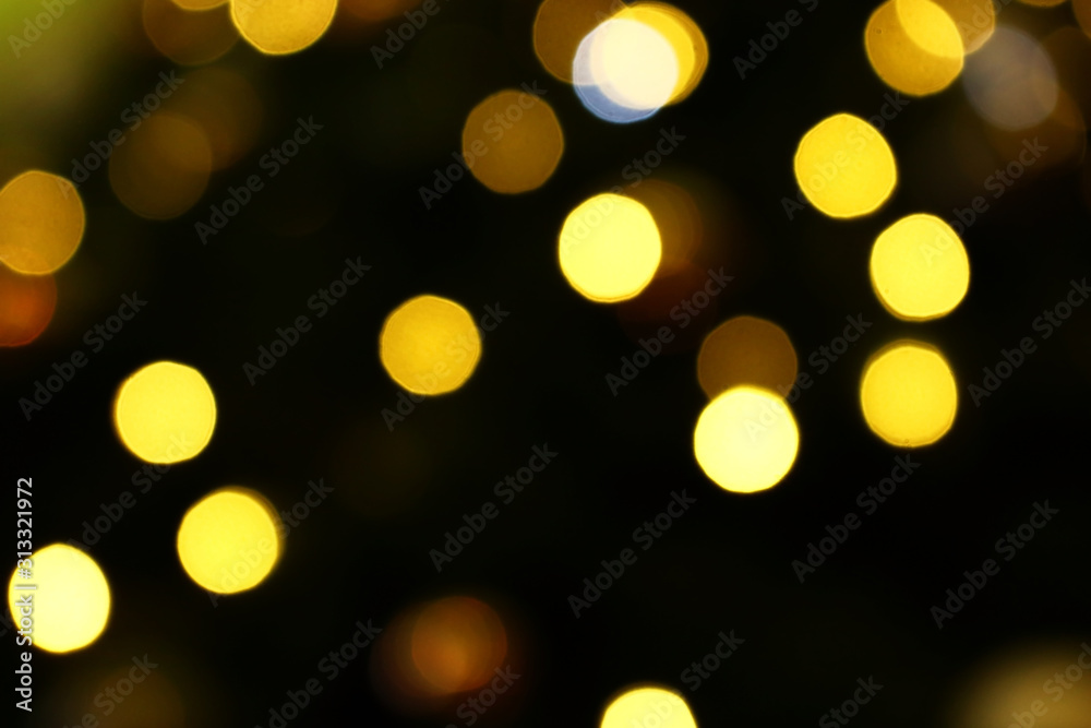 Obraz premium Long exposure blurred yellow christmas tree lights abstract background