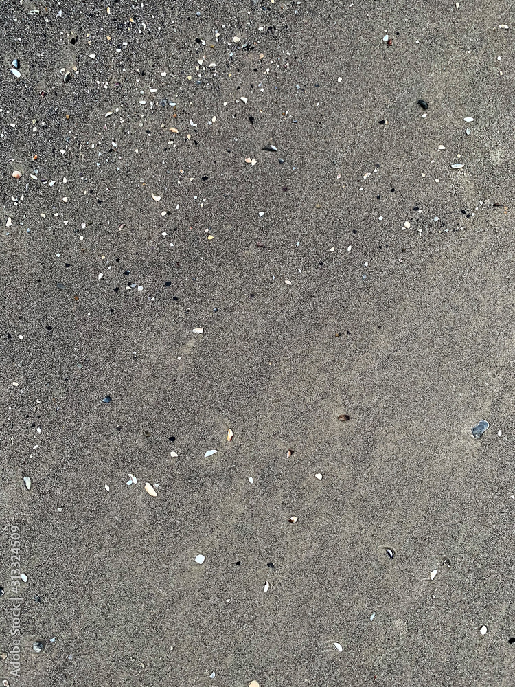 Wet grey sand texture Wet grey sand texture