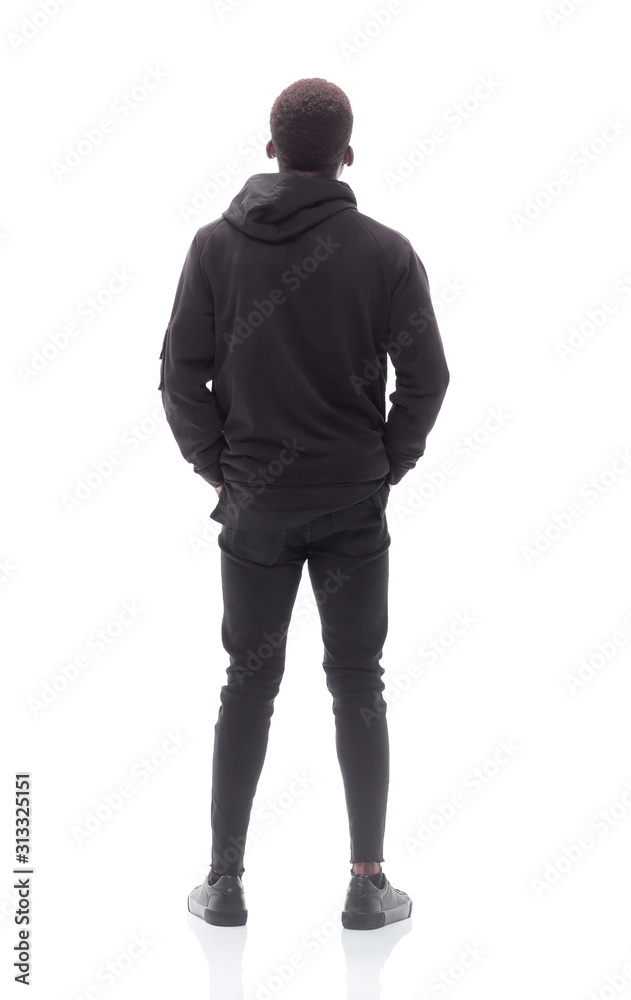 serious guy looking at the white wall. isolated on white serious guy looking at the white wall. isolated on white