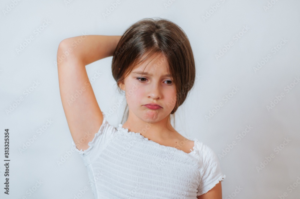 Caucasian little cute girl unhappy with very long hair, portrait Caucasian little cute girl unhappy with very long hair, portrait