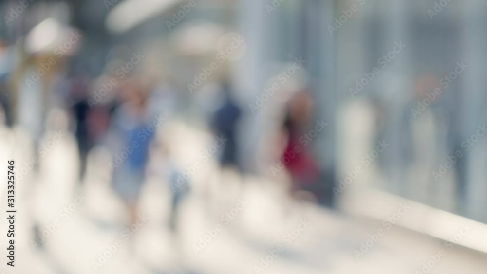 Abstract blurry New York City scenery of a fashionable Manhattan shopping area, unrecognizable people walking, sunny bright summer day Abstract blurry New York City scenery of a fashionable Manhattan shopping area, unrecognizable people walking, sunny bright summer day