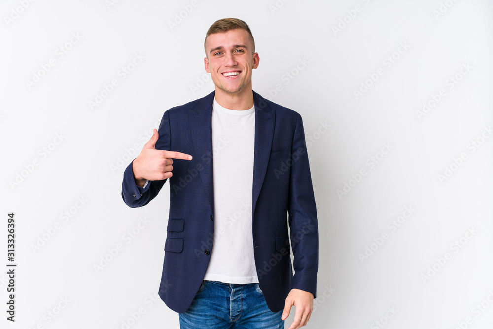 Young business caucasian man person pointing by hand to a shirt copy space, proud and confident Young business caucasian man person pointing by hand to a shirt copy space, proud and confident
