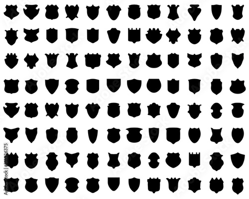 Black silhouettes of shields on white a background, vector