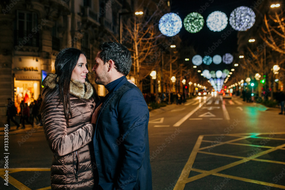 Couple in love in the city christmas