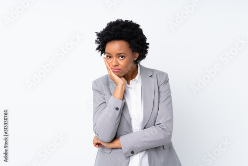 фотографія African american business woman over isolated white background unhappy and frust