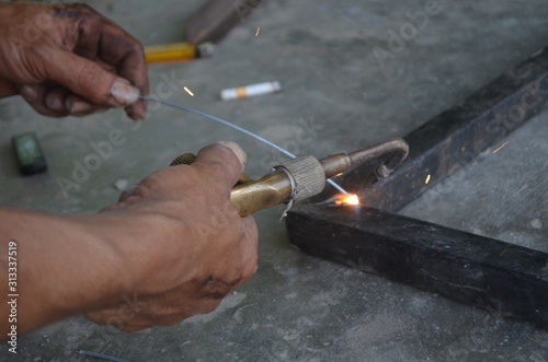 A close up photo of gas welding. 