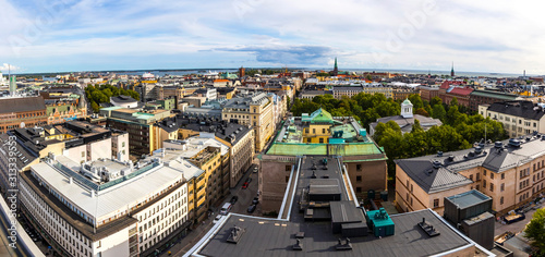 Panoramic aerial view of Helsinki city  capital of Finland. Baltic sea on background