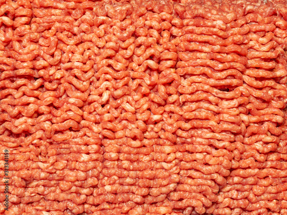 Industrially Ground Beef, Raw Ingredient Ready for Further Preparation - Cooking, Baking, Marinating Industrially Ground Beef, Raw Ingredient Ready for Further Preparation - Cooking, Baking, Marinating