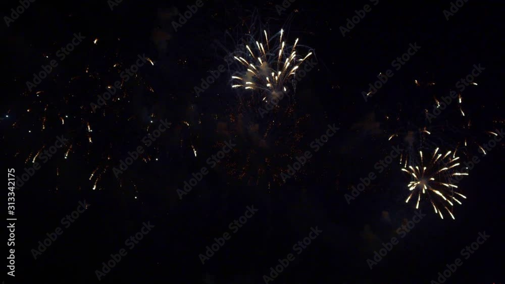 Beautiful abstract colourful Fireworks explode display on sky at night a symbol of celebration in New years anniversary for background