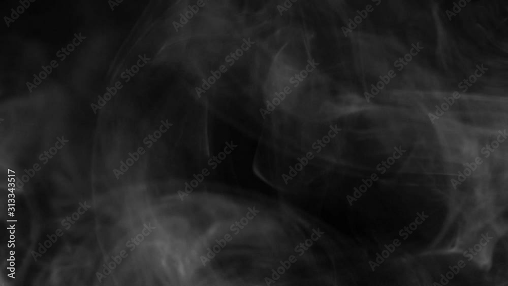 Real white smoke on black background. The concept of transitions for video editing using the alpha channel. Effects for double exposure and contrast abstract.