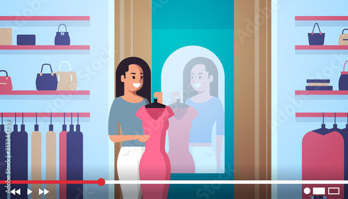 fashion blogger recording online video girl vlogger trying new dress in clothing store live streaming blogging concept modern boutique interior portrait horizontal vector illustration
